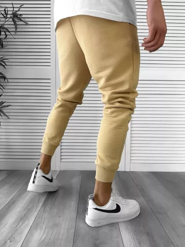 Pantaloni de trening bej conici k041 55-4